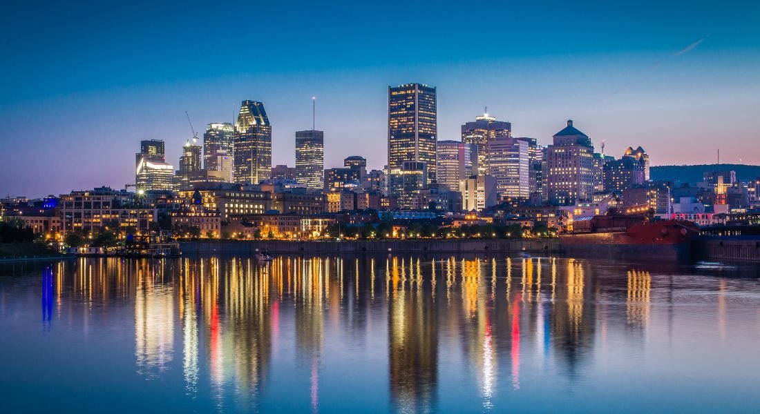 The city from the river at dusk